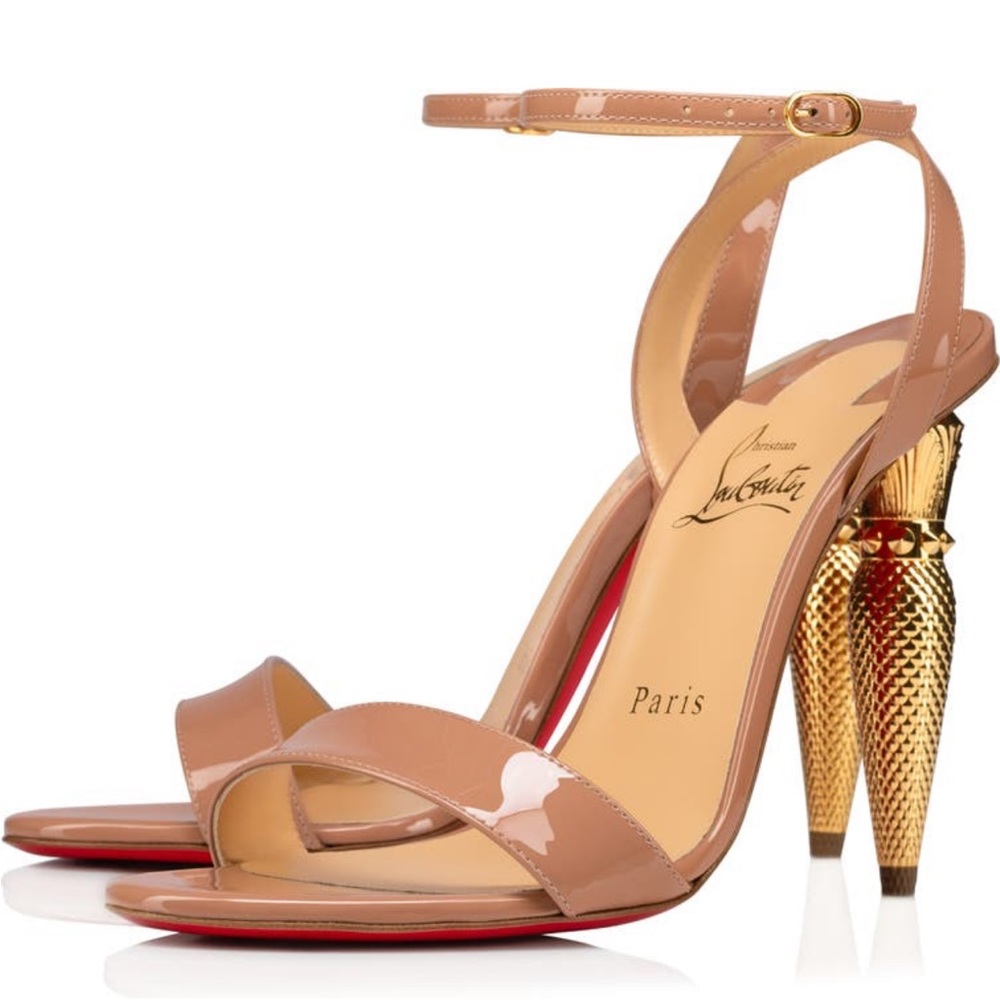 Christian Louboutin nude patent leather lipqueen heels.
